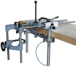 Horizontal guide stand for HEMA chain slotter