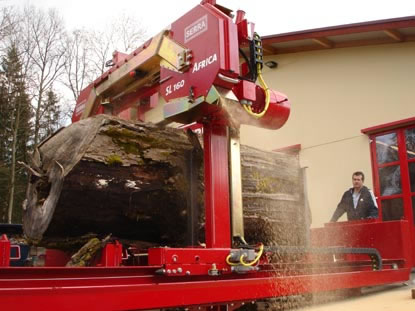 The "Africa" portable sawmill sawing a giant log